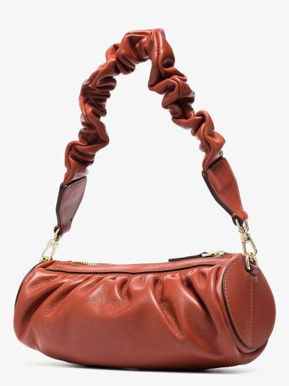 Ruched mini cylinder leather bag