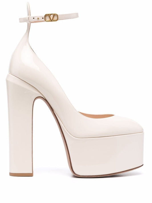 Tan-go patent leather pumps