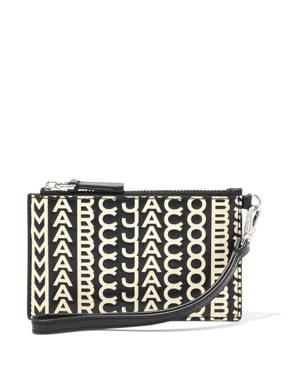 The monogram leather top zip wristlet wallet