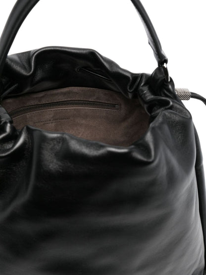 Soft leather bucket bag with precious details