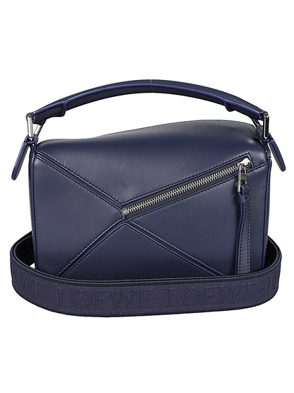 Puzzle small leather handbag