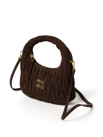 Wander suede leather handbag