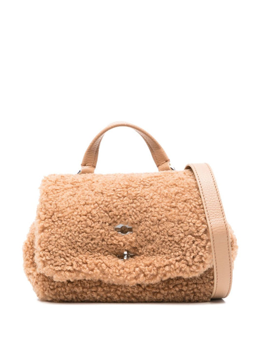 Postina dolly baby leather handbag