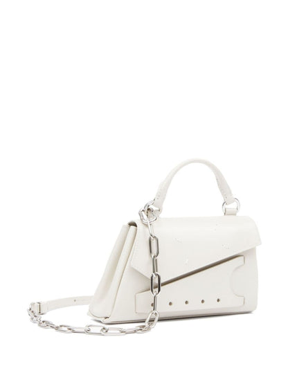 Snatched asymmetric micro leather handbag