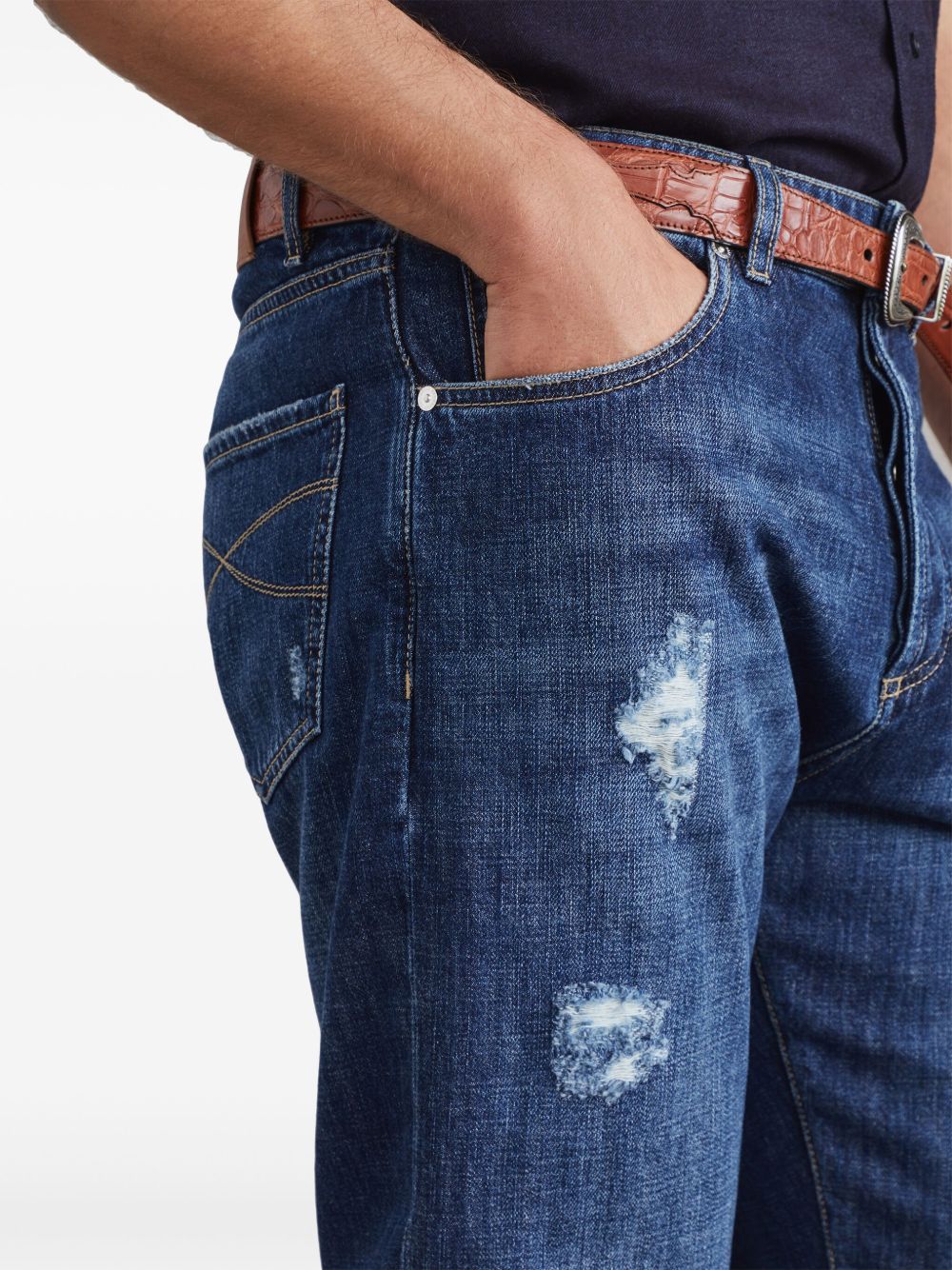 Denim jeans with tears