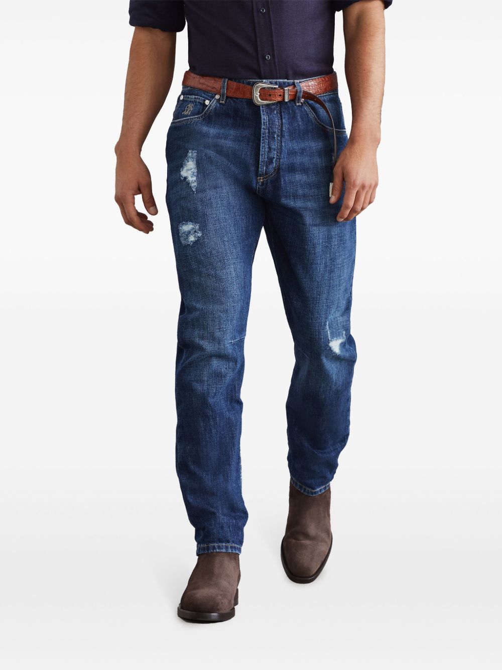 Denim jeans with tears