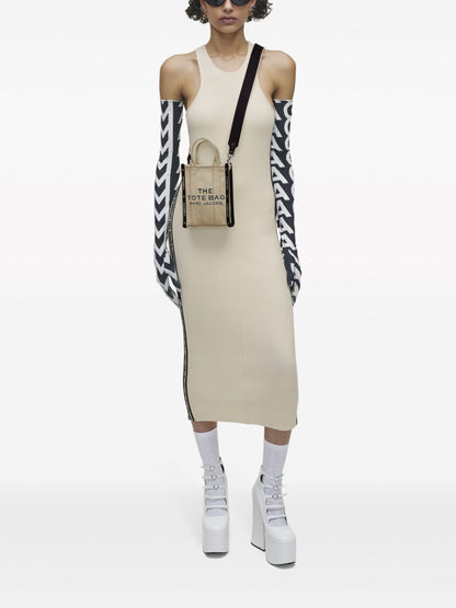 The crossbody tote canvas tote bag