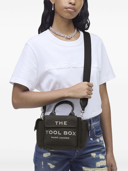 The crossbody tote canvsas tote