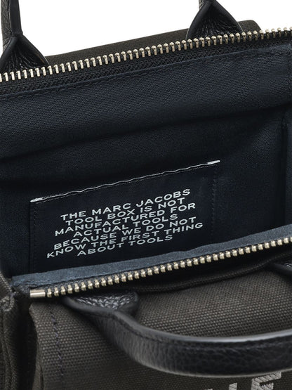 The crossbody tote canvsas tote